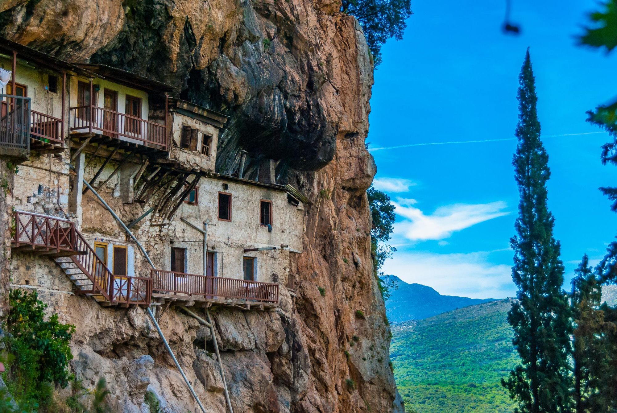 The Monastery of Prodromos, built into the cliff on one of the latter stages of the Menalon Trail. Photo: Getty