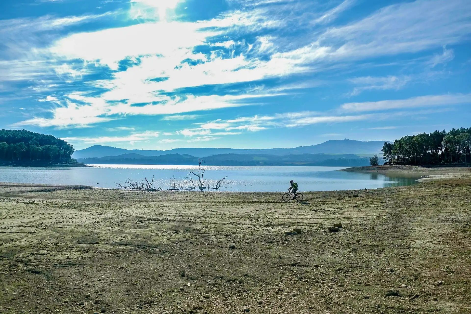 Cycling around San Giuliano Lake in Puglia.