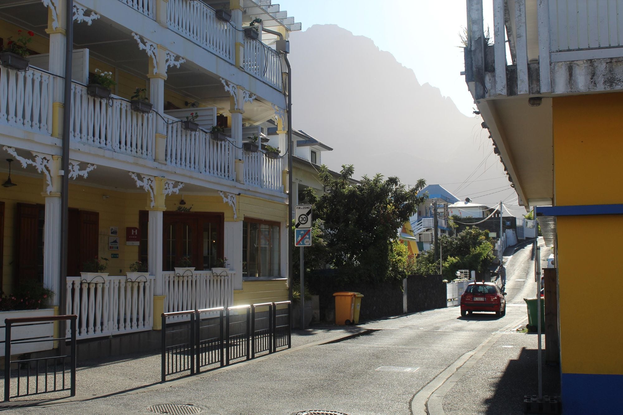 The streets of Cilaos, sitting pretty beneath the high rock walls. Photo: Stuart Kenny