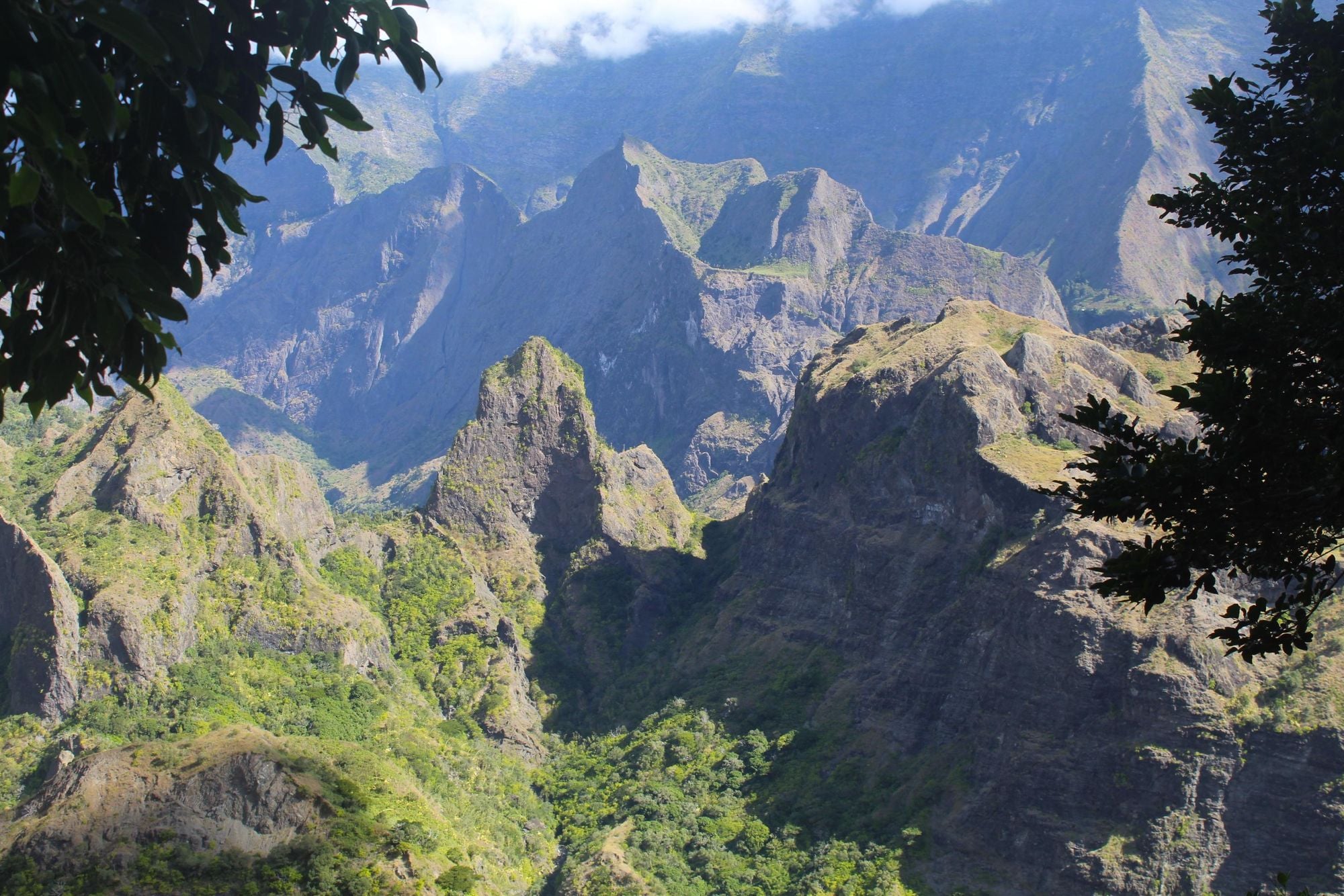 The majestic cirque of Mafate, a place of mountain ridges and lush greenery. Photo: Stuart Kenny