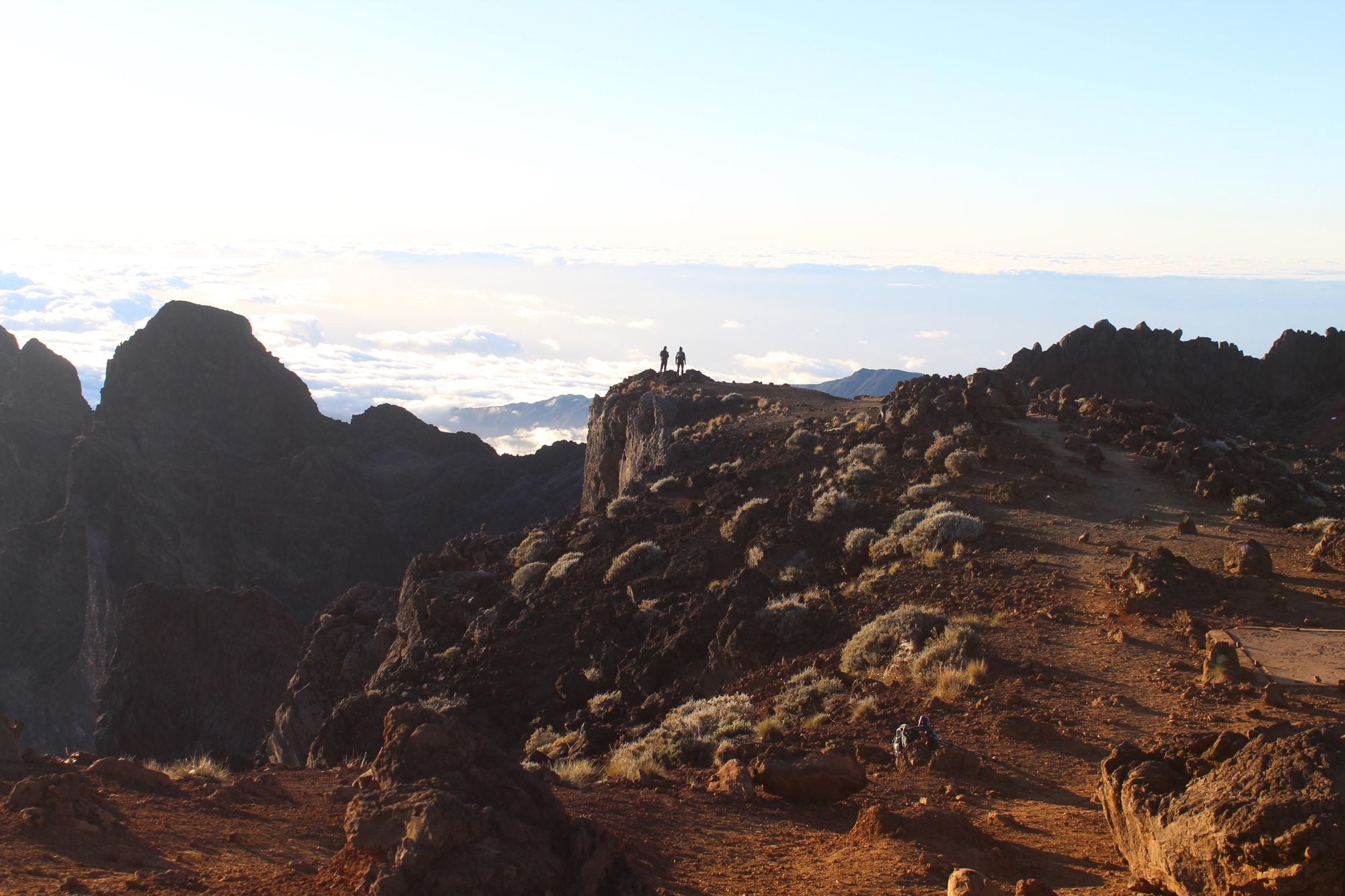 The red rocks begin to glow as the sun goes down on Reunion. Photo: Stuart Kenny