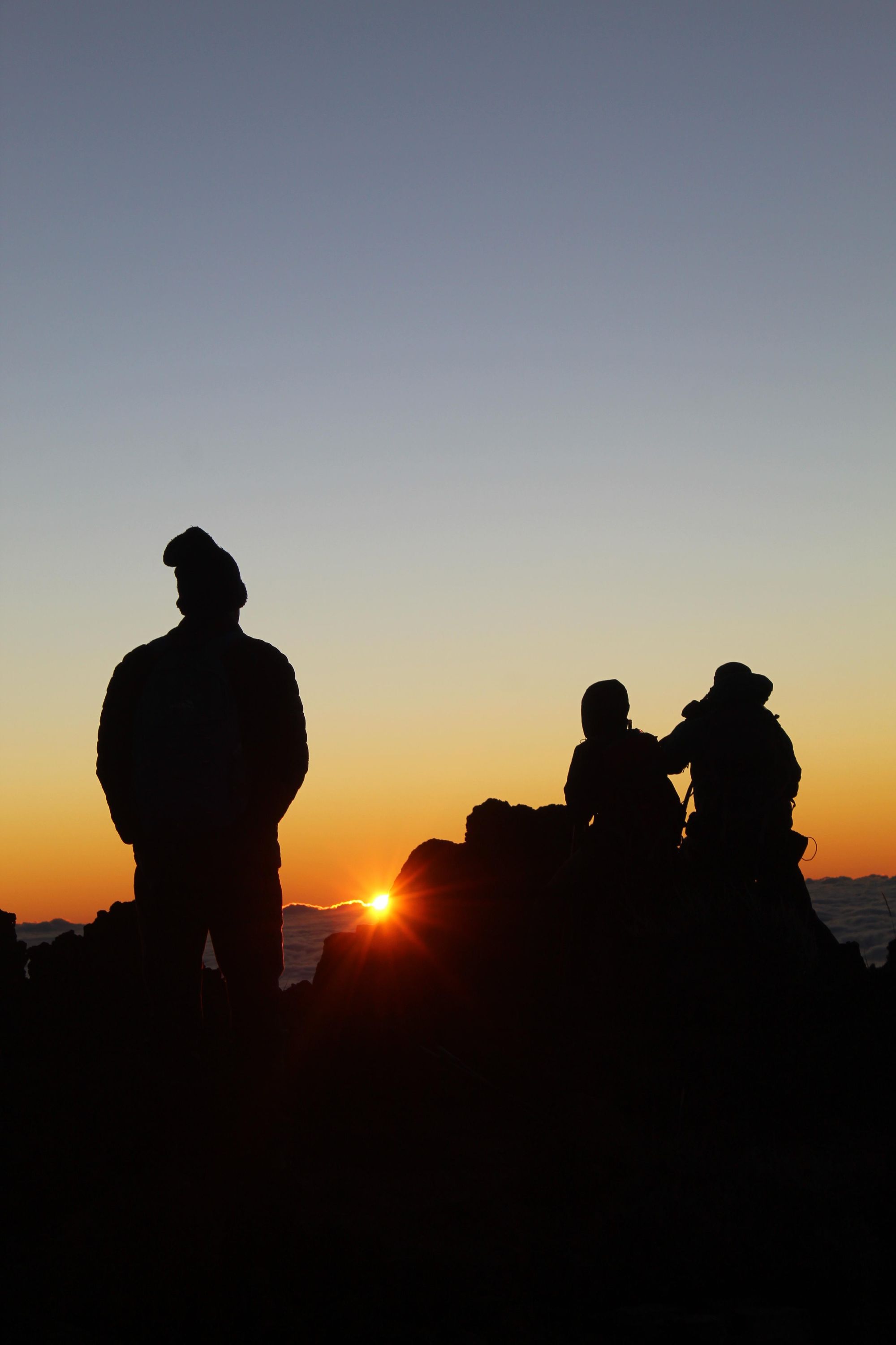 Scenes from the summit of Piton des Neiges, as sunset falls on the volcanic rock. Photos: Stuart Kenny