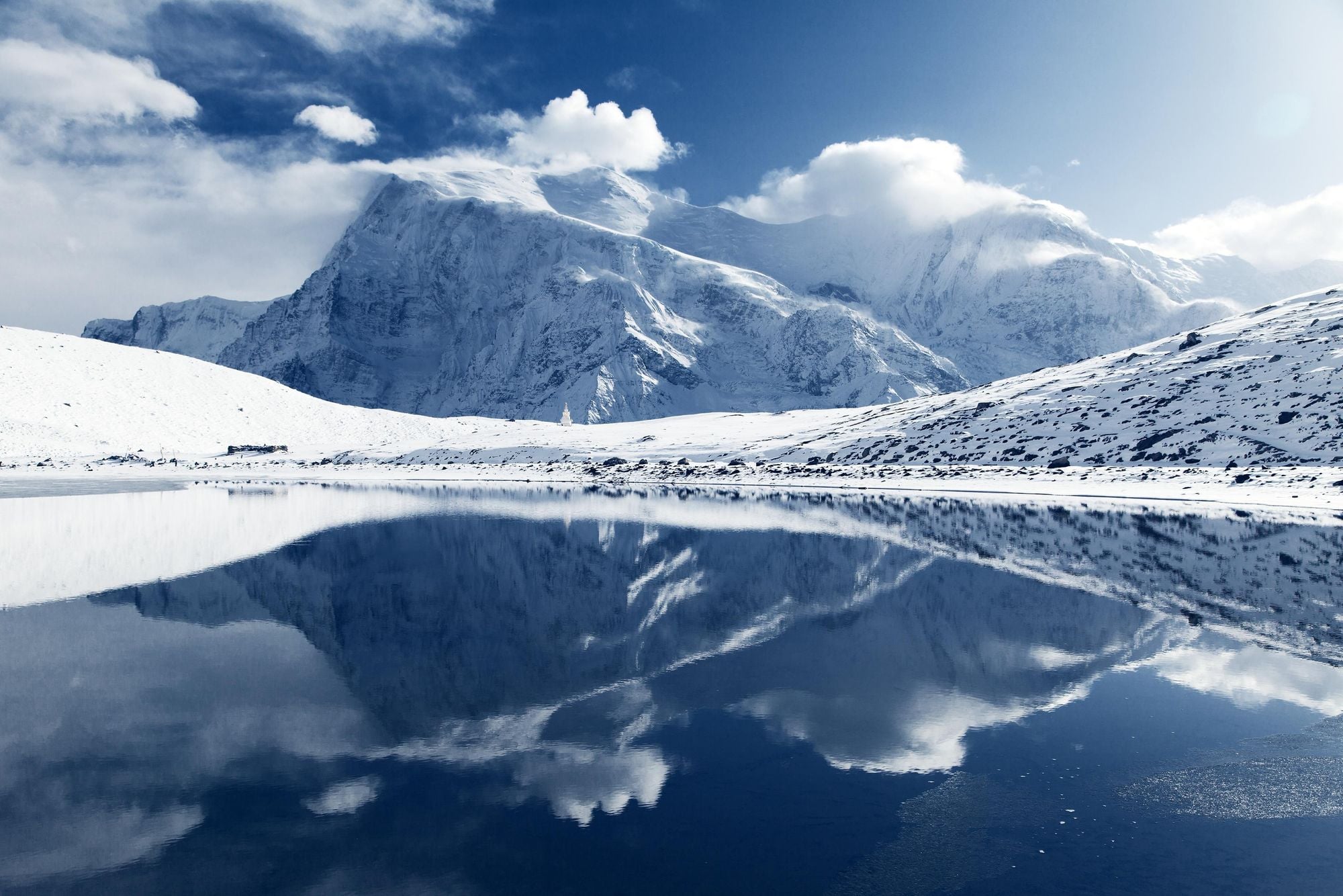 Annapurna III and Ganggapurna reflected in the waters of Kicho Tal. Photo: Getty.