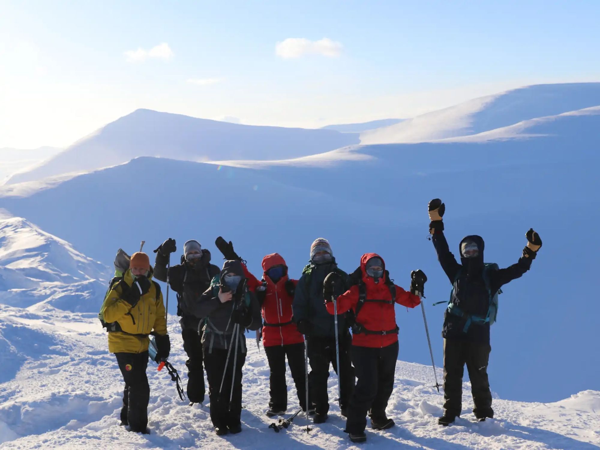 A hiking group in Svalbard enjoy the return of the light. Photo: Svalbard Wildlife Expeditions.