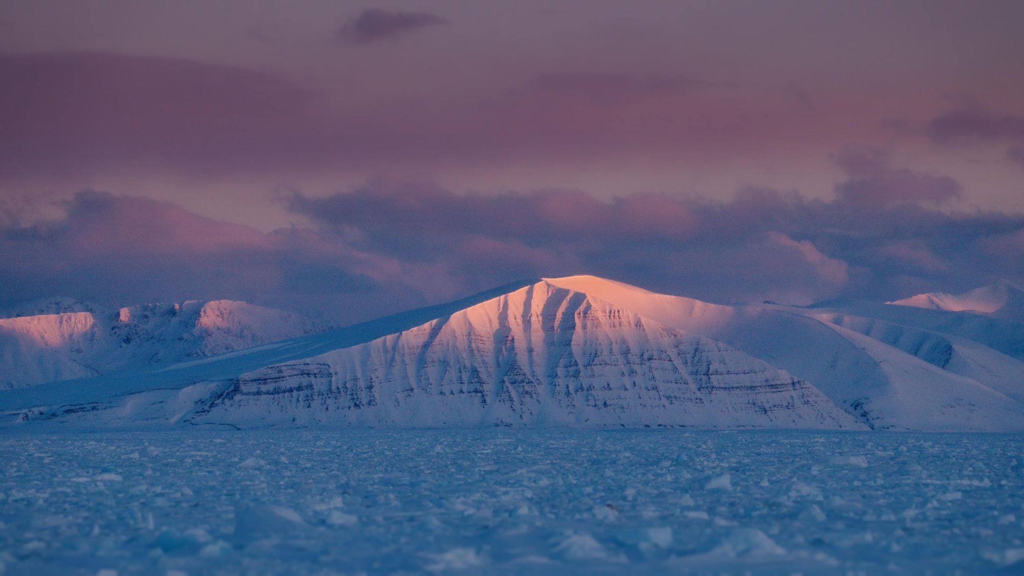 The pinks and blues of February in Svalbard. Photo: Getty.