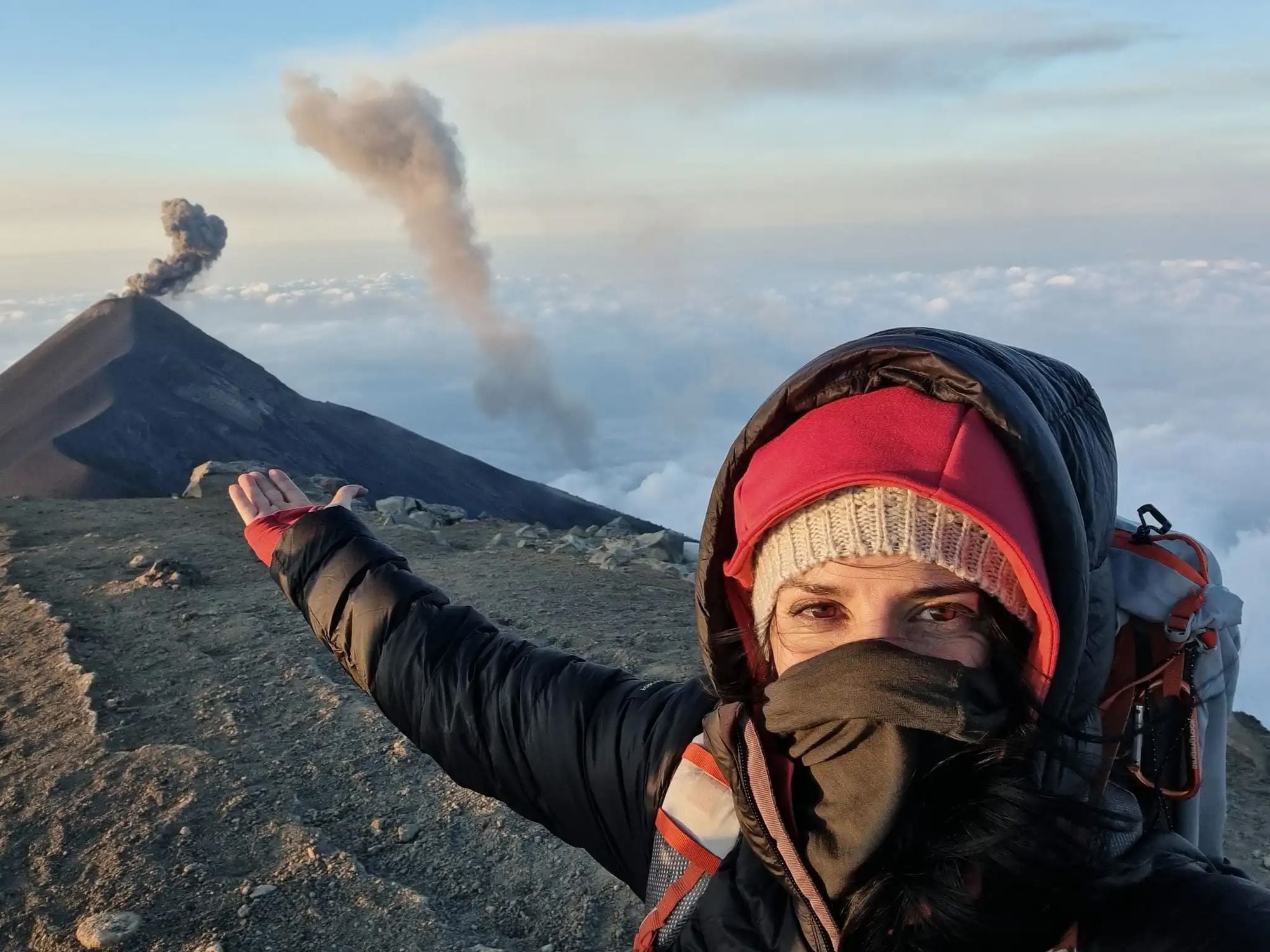Hiker on the summit of Acatenango Volcano, Guatemala. Photo: Marta Marinelli.