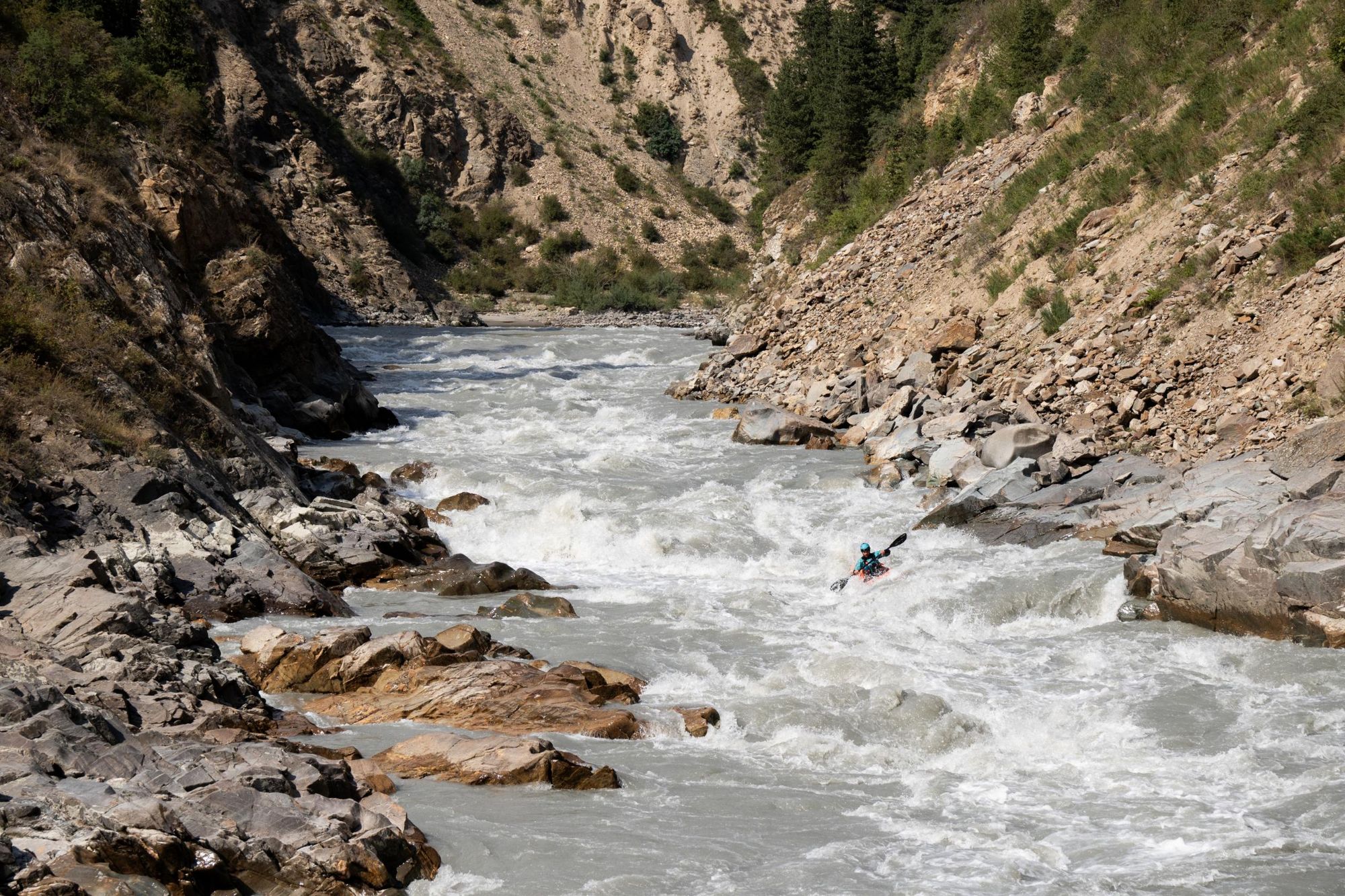 Paddling on the glacial rapids of the River Naryn. Photo: Michal Kuthan