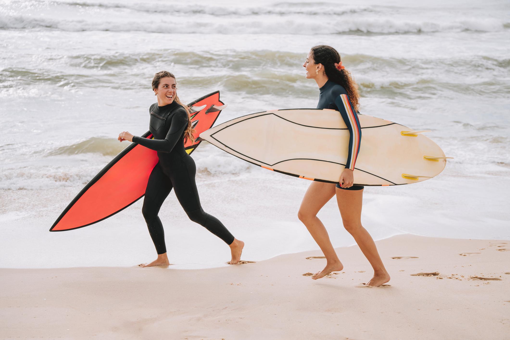 The shared stoke of catching waves and cheering for others to do the same means friendships form quick in the line up. Photo: Getty