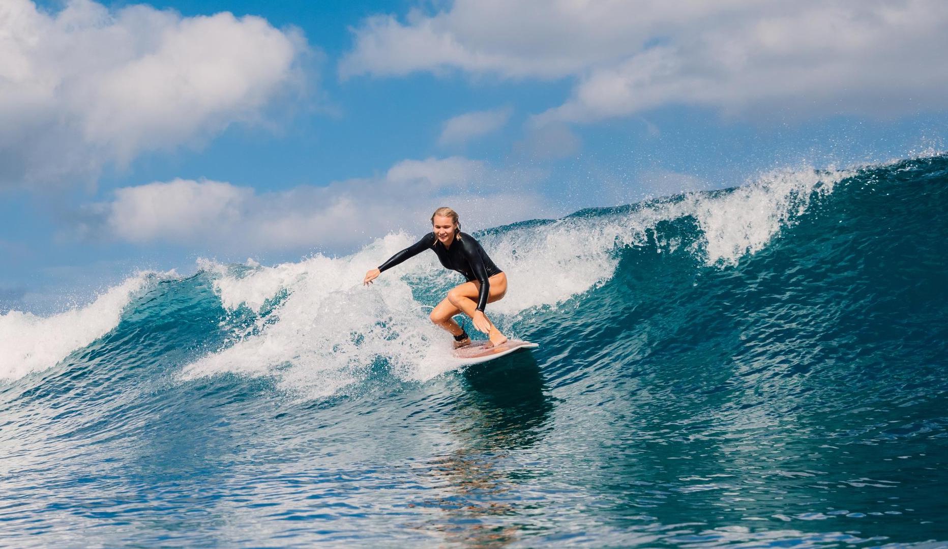 The shared experience of riding waves, and picturing yourself on another's wave, can be a bonding experience. Photo: Getty