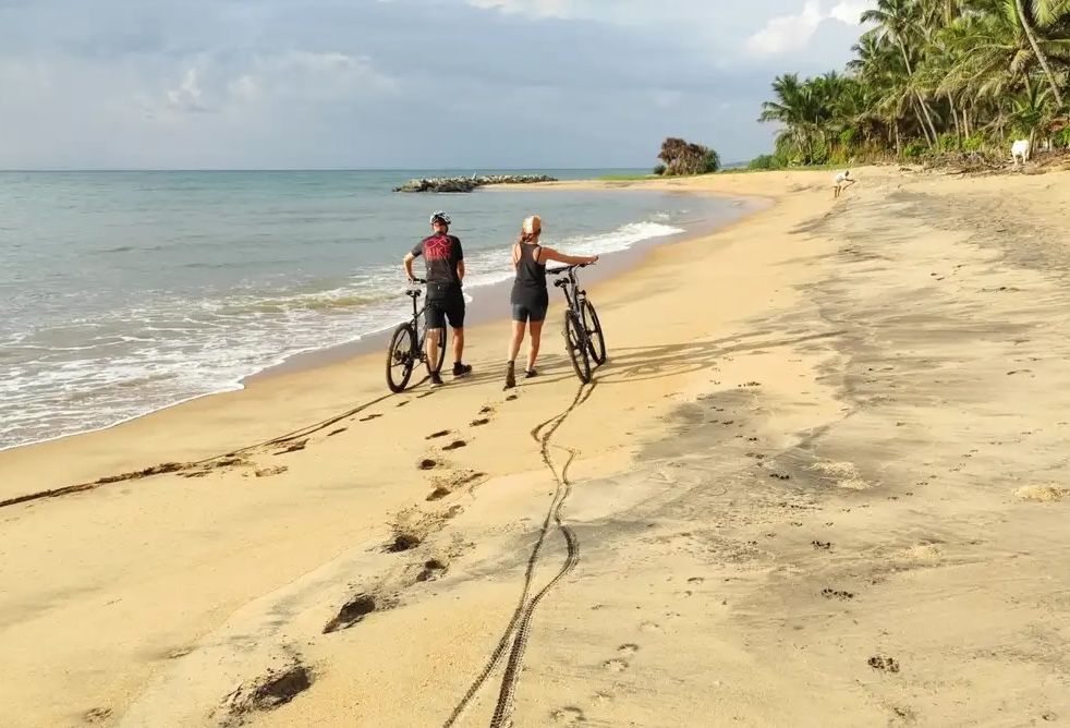 Cyclists at Pasikuda Beach. Photo: Action Lanka.