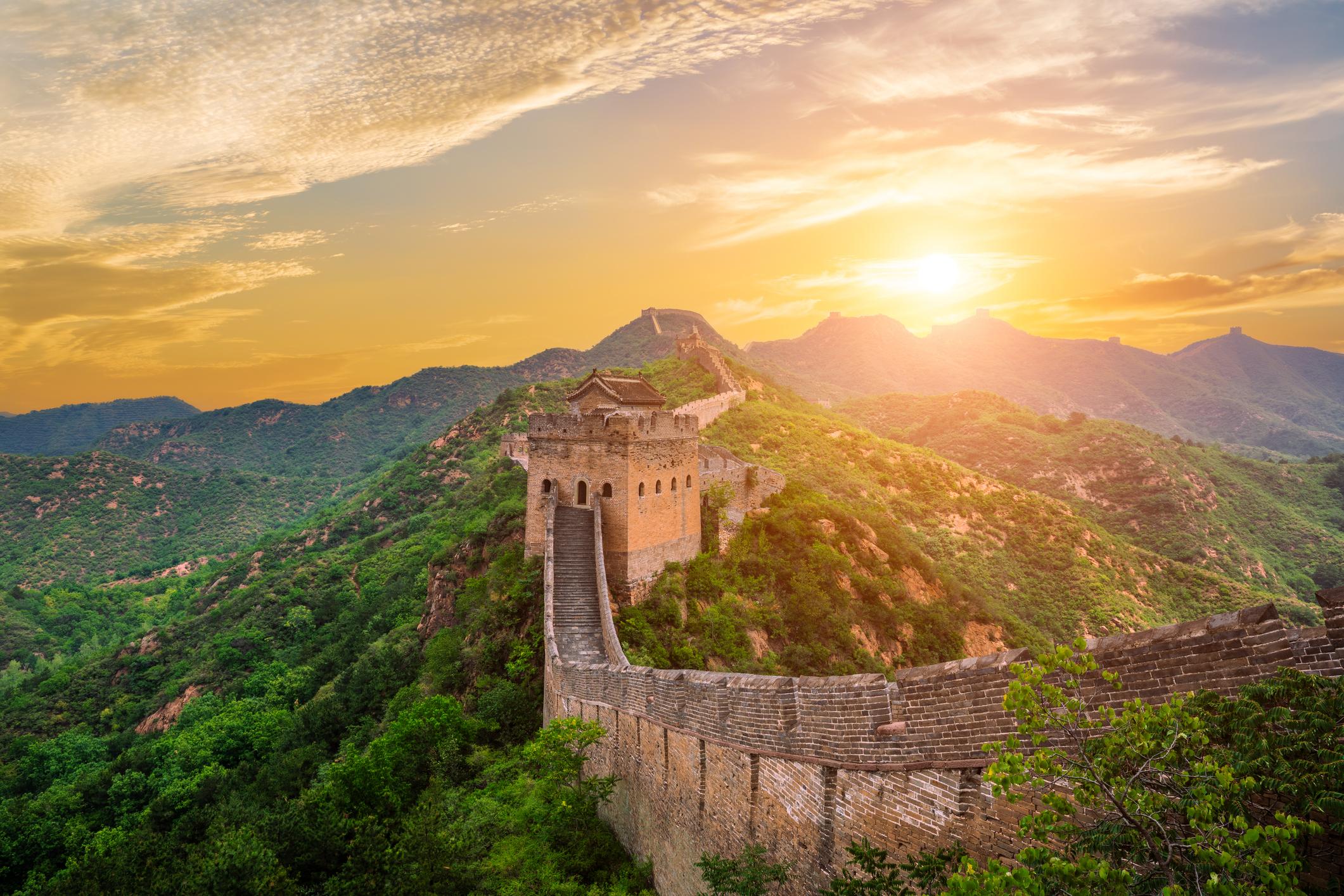Sunrise above the mountains on the Jinshanling section of the Great Wall. Photo: Getty