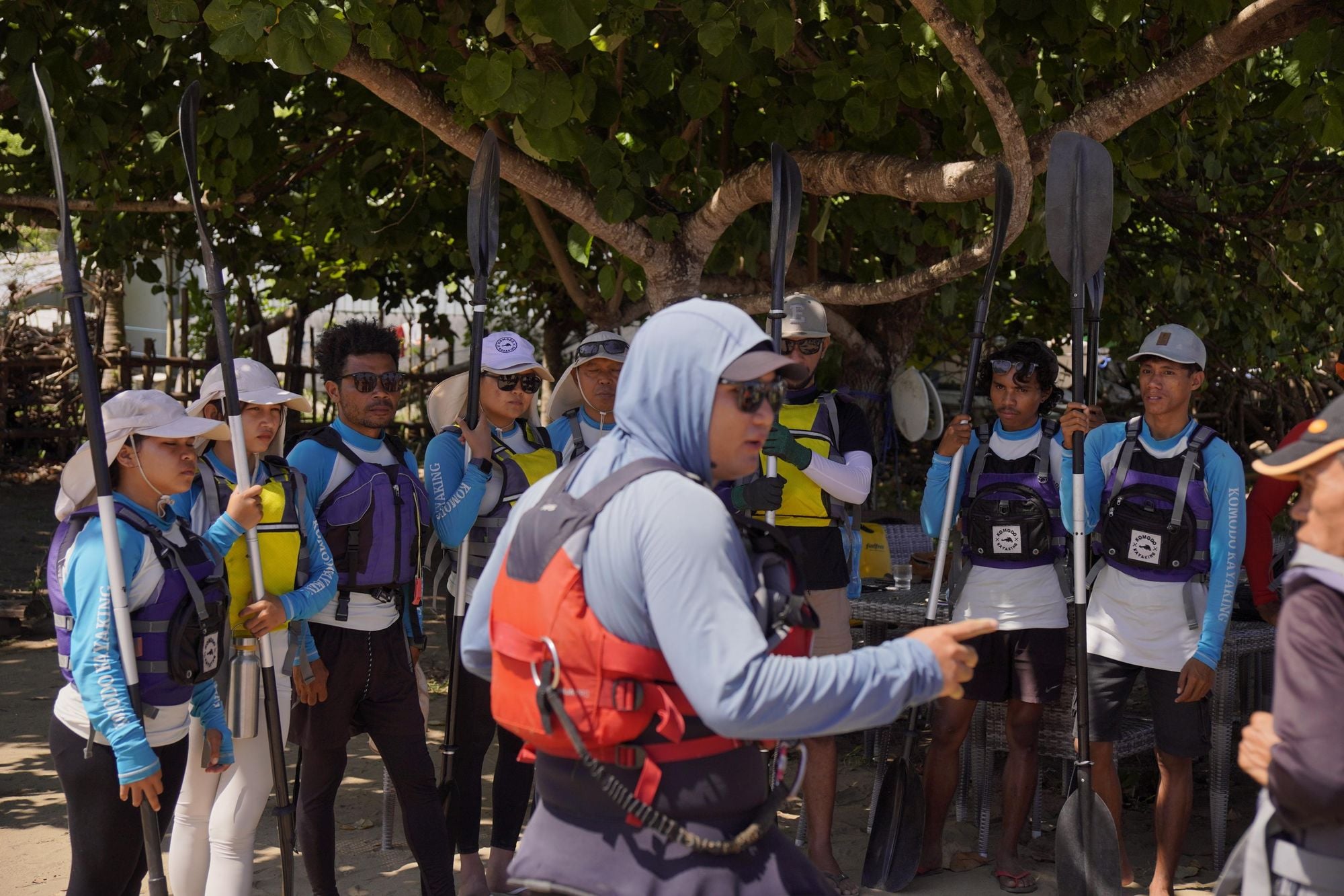 A crew of eager paddlers learning to be the next lead guides in Indonesia. Photo: Komodo Kayaking