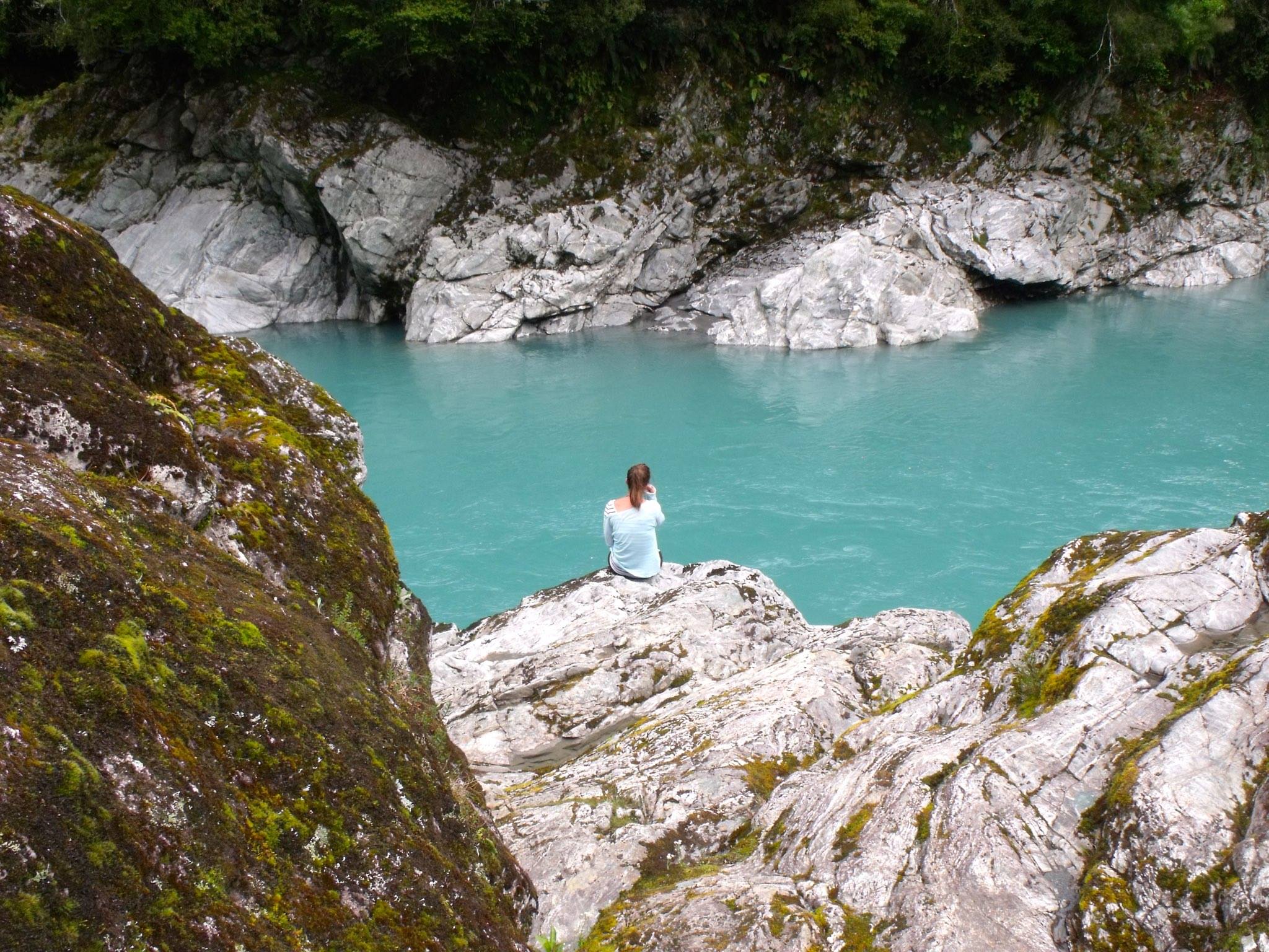 The author eating cheese sandwiches overlooking Hokitika Gorge. Photo: Lynsey Smith