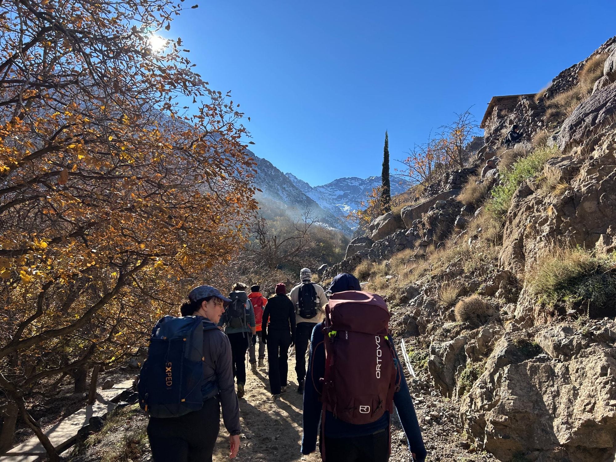 The hiking group heads out of Imlil, heading for the mountain refuge which sits beneath Toubkal. Photo: Sian Lewis